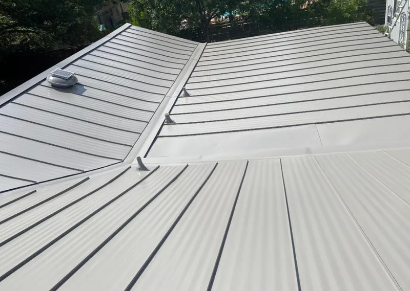 Solar attic fan installed on a metal roof for Roof Ventilation in El Segundo